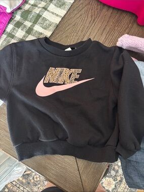 Nike Black Sweatshirt with Pink Swoosh and Leopard Print Logo